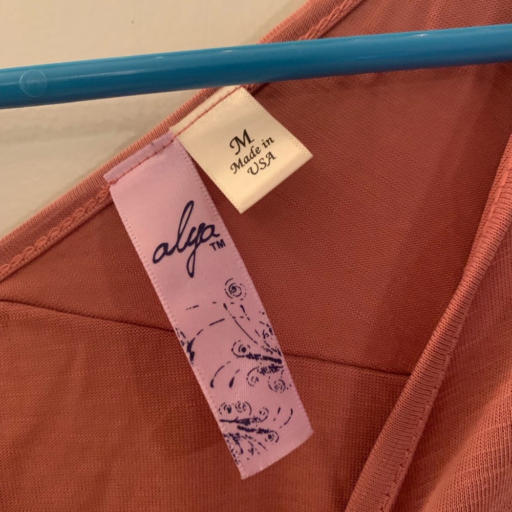 Medium pink v neck loose shirt from Francesca’s!